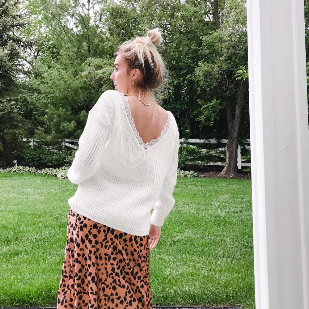 ASOS White lace reversed v cut sweater.